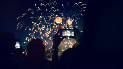 People are shooting fireworks display with their phones. Smartphone shooting Stock Footage