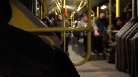 People are standing at the bus stop in the evening. Blur. defocus Video stock 109801571