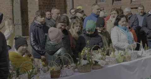People are standing next to Easter baskets, 4K 스톡 동영상 183035333
