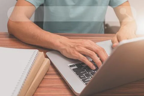 People are using computers to find information and knowledge in the online wo Stock Photos