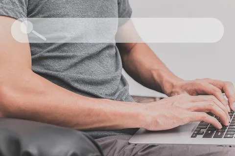 People are using computers to find information and knowledge in the online wo Stock Photos