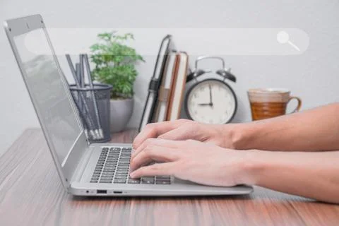 People are using computers to find information and knowledge in the online wo Stock Photos