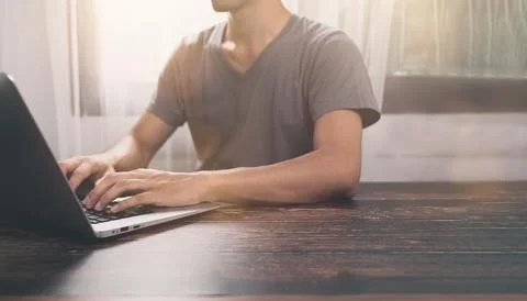 People are using notebook computers, working, playing games, communicating,.. Stock Photos
