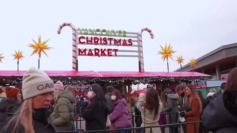 People are waiting in line to enter The Vancouver Christmas Market in downtown Stock Footage 166470233