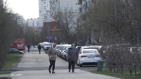 People are walking in almost empty street in Moscow during quarantine Stock-Footage 128592318