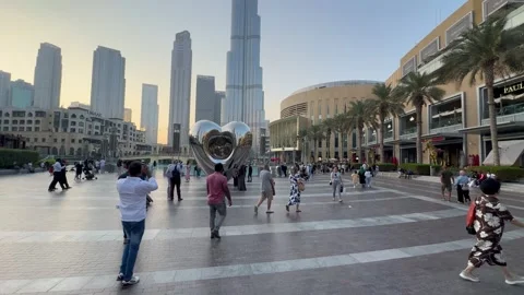 People are walking around the square in Downtown. Dubai UAE 4 September 2026. Stock Footage 345224636