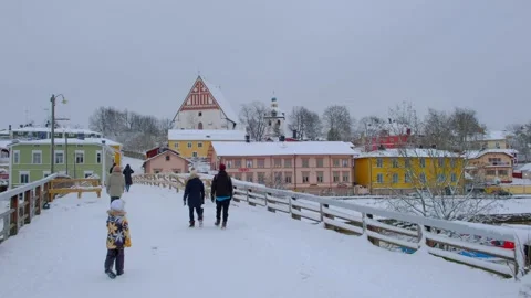 The people are walking on the bridge to the Old Porvoo. Stock Footage 147997780