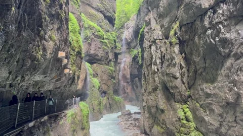People are walking on an elevated path next to the Partnachklamm gorge. Germany 스톡 동영상 341509961