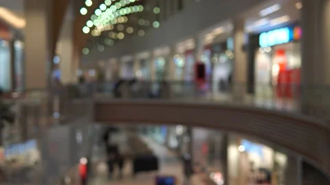 People are walking in the mall. Image out of focus 動画素材 236428209