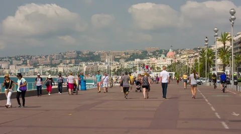 People are walking on the Promenade des Anglais in Nice city Video stock 59088872