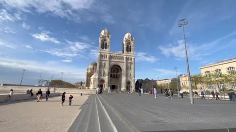 People are walking on square in front of Marseille Cathedral. Marseille, France Stock Footage 241657304