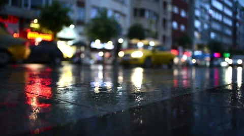 People are walking on the street after rain in Istanbul, Turkey. Stock Footage