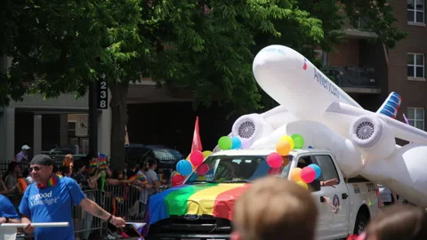 People are watching at pride parade. american airlines group. Slow motion Stock Footage 249093053