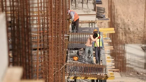 People are working at a construction site  (EDITORIAL) 24 Stock Footage 318949848