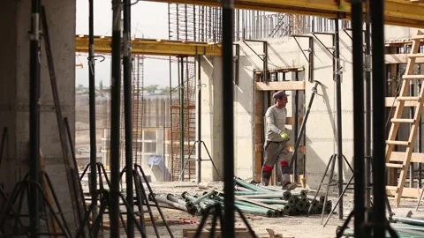 People are working at a construction site  (EDITORIAL) 27 Stock Footage 318949855