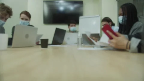 People are working together in the office room and looking through documents Stock Footage 159354857