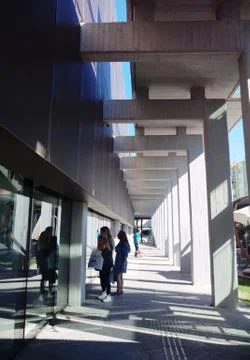 People around of perfect architecture with rectangular frames Stock Photos