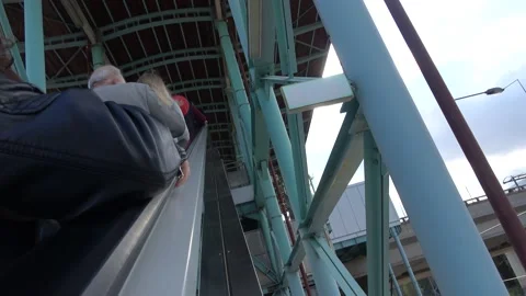People ascending by escalator Stock Footage 147047544