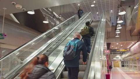 People ascending escalator at Garibaldi FS station on Milan M5 line Stock Footage 336901384