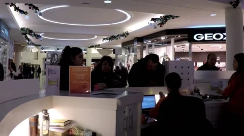People asking information inside shopping mall Stock Footage 45924834