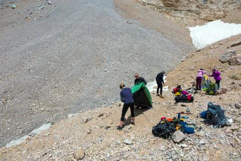 People Assembling Bivouac Stock Photos