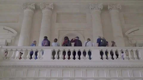 People on the balcony observing the historic interior architecture at Stock Footage 305756182