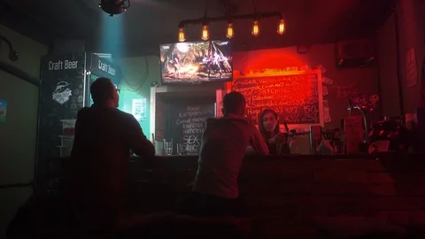People in bar play in computer game and drink beer. 스톡 동영상 88440520