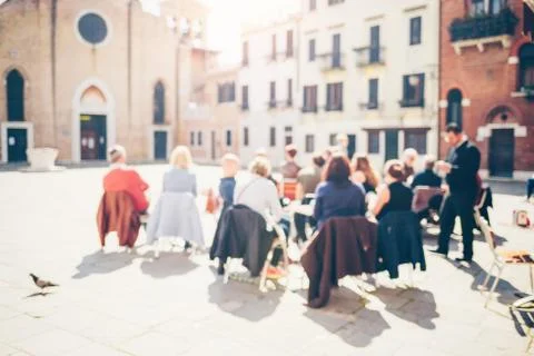 People basking in the sun. Stock Photos