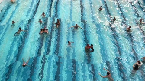 People bathe in the clear water of the pool.  Stock Footage 120136748