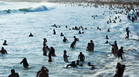 People bathing in Arpoador Beach Stock Footage 34626410