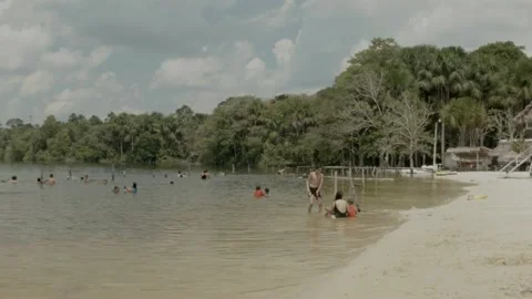 People bathing on a beach at the Amazon River Stock Footage 188917387