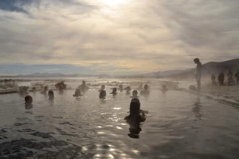 People bathing in hot spring Stock Photos
