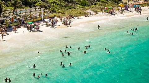 People bathing in Lighthouse Beach Stock Footage 35562844