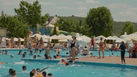 People bathing in a pool at a Aqua Park. Stock Footage 299920934