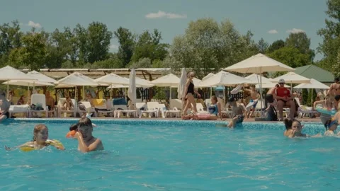 People bathing in a public pool at an Aqua Park. Stock Footage 299921004