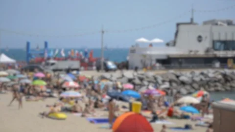 People at the Beach Blurry Crowd Stock Footage 102434446