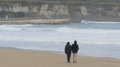 People in the beach during winter in Spain, 4K Stock Footage 112434918