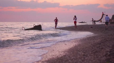 People on the beach Stock Footage 8548376