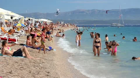 People on the beach Stock Footage 11680413