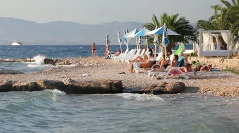 People on the beach Stock Footage 22047847