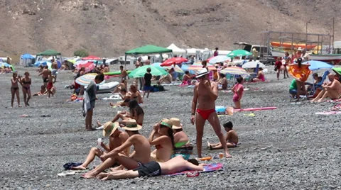 People on the beach Stock Footage 34402866