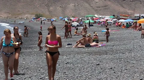 People on the beach Stock Footage 34404929