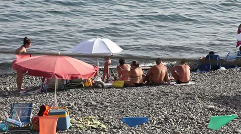 People on the beach Stock Footage 34434876