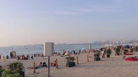 People on the beach Stock Footage 75843479