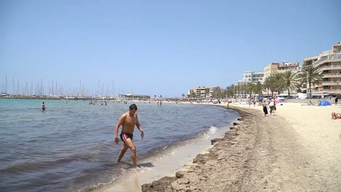 People by the beach Stock Footage 128349050