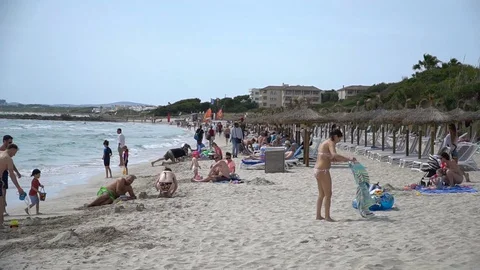 People at the beach Stock Footage 128351972