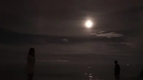 People at beach for full moon Stock Footage 55309570