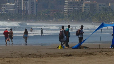 People on the beach with heat waves Stock Footage 108901189
