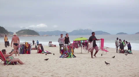 People on the beach in rio Stock Footage 62334981