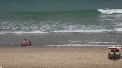 People at the beach - Summer Stock Footage 111037783